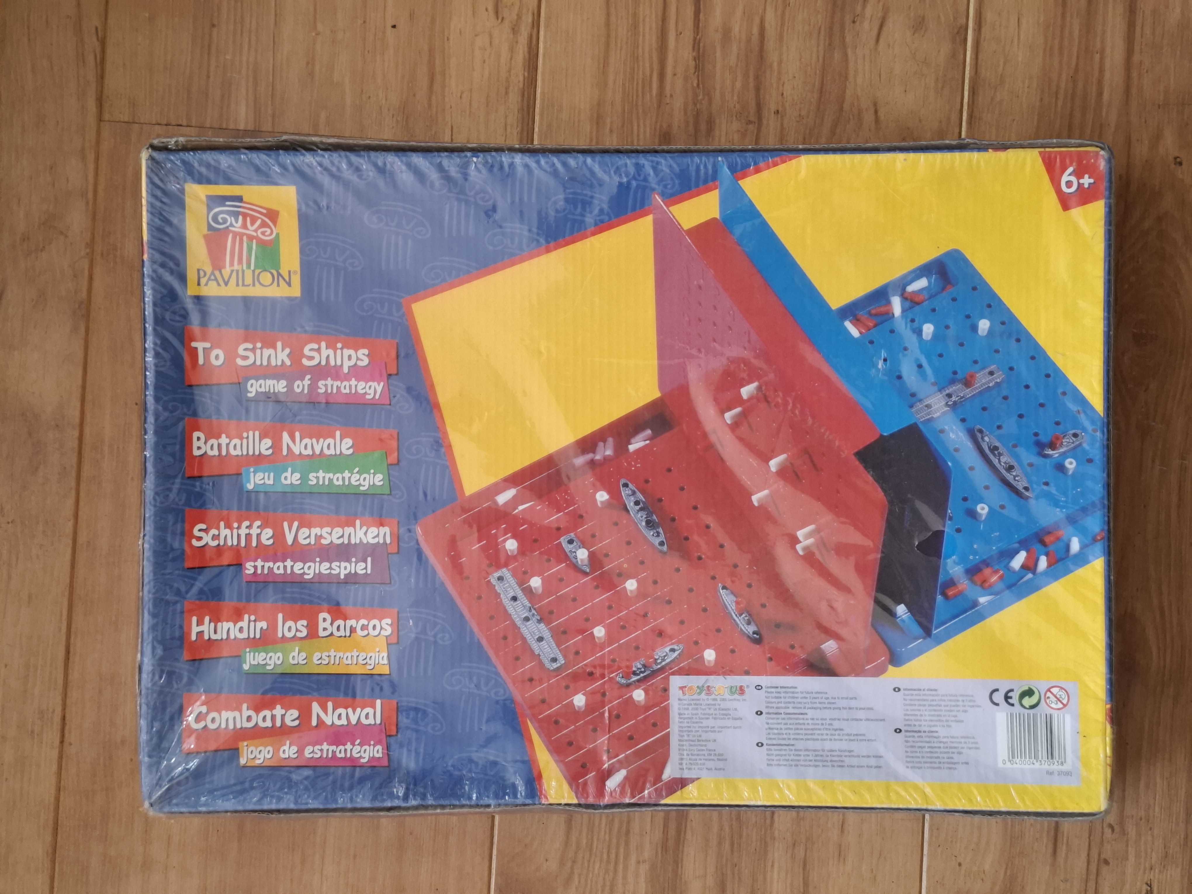 Pavilion To Sink Ships box, face with the Toys R Us safety and distribution panel, barcode and CE mark