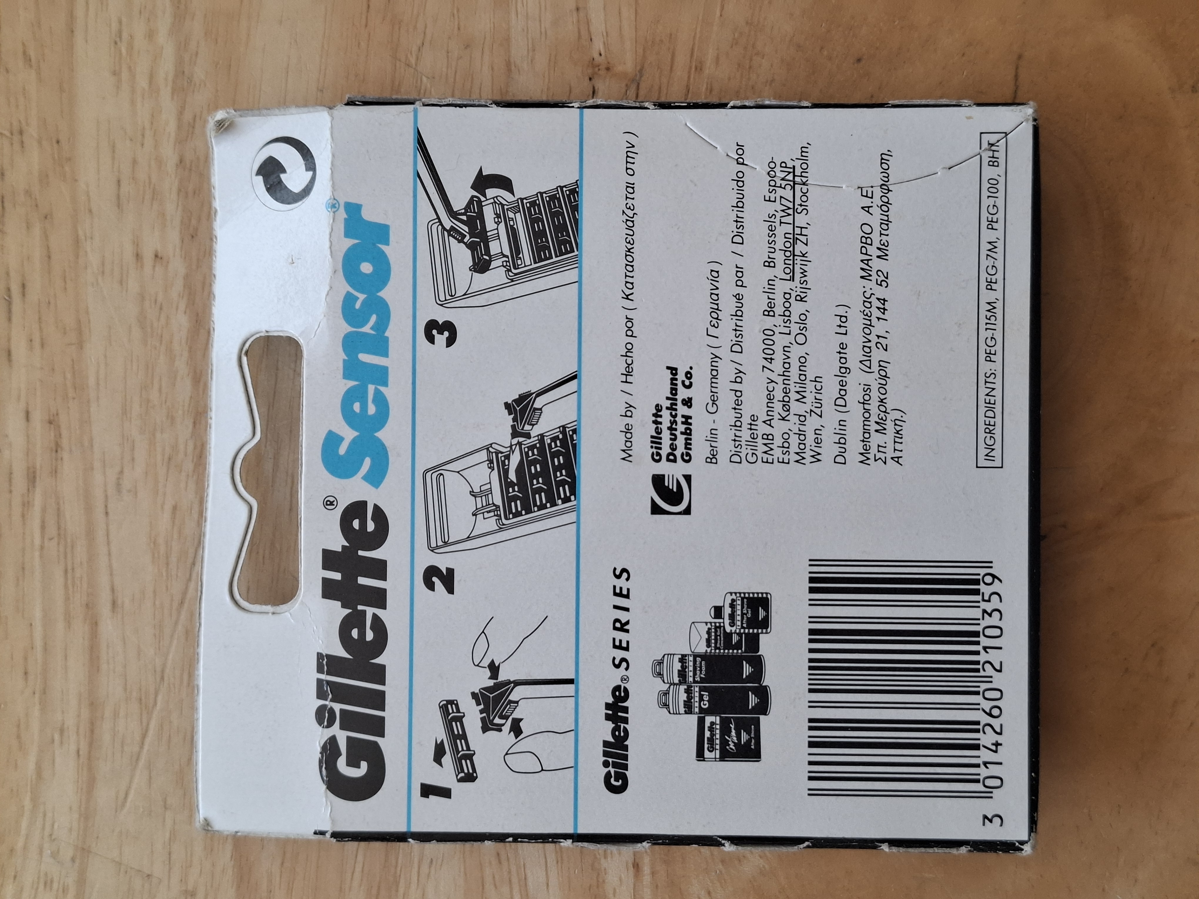 Gillette Sensor carton back, showing three-step dispenser-tray pictogram, distributor list and barcode